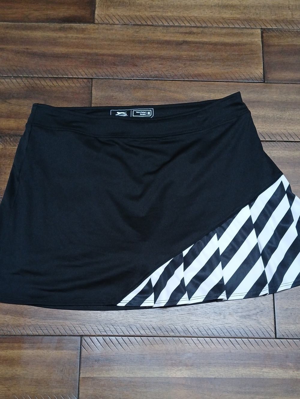 Slazenger Black A-Line Skort with White Diagonal Stripe Panel